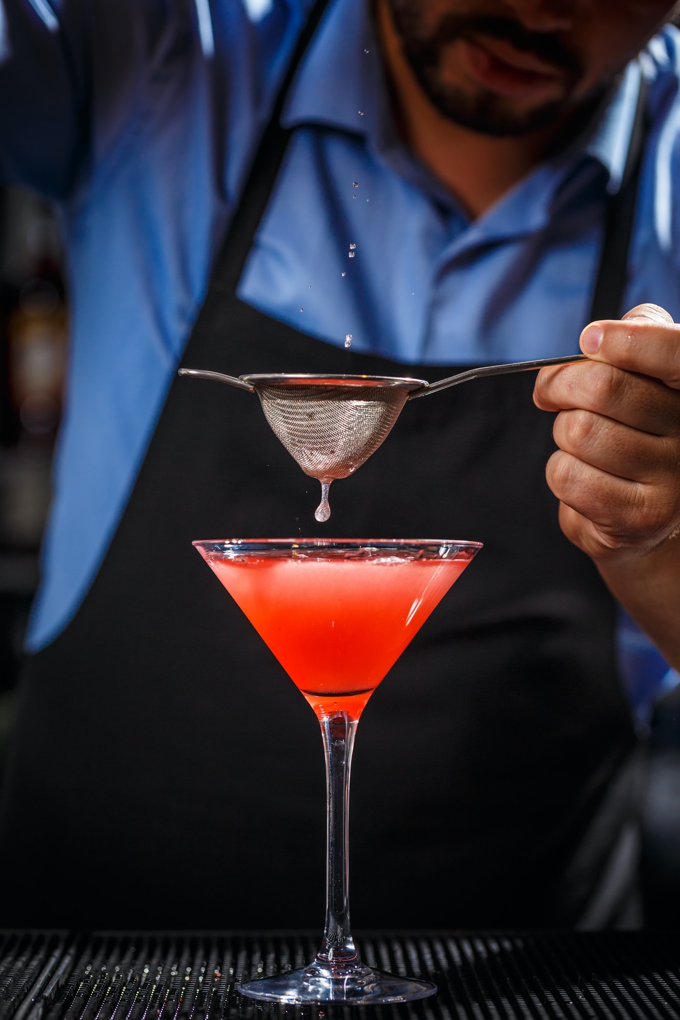 barman-makes-cosmopolitan-cocktail.jpg